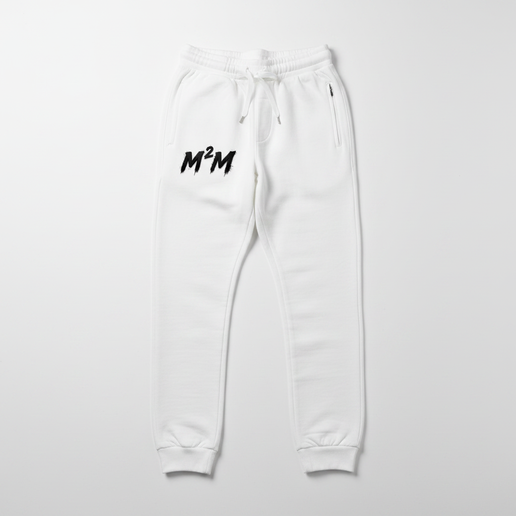 White jogger pants with M2M brushstroke logo on left leg